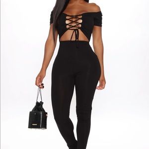 FashionNova cutout black jumpsuit